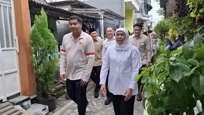 Menteri Perumahan Rakyat, Maruar Sirait bersama Gubernur Jawa Timur, Khofifah Indar Parawansa.